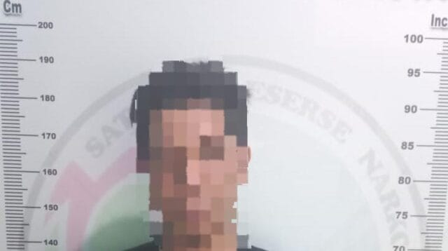 RMS (35) telah diamankan Polres Gorontalo Kota, karena ketahuan hisap ganja, foto/Ist