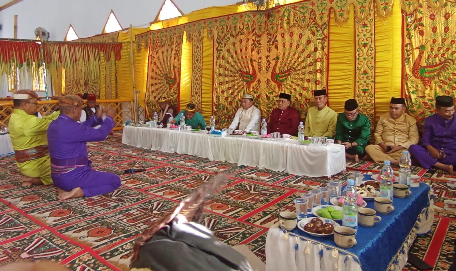 Wabup Risman Tolingguhu disambut khitmad dengan adat, foto/Ist