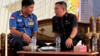 Ketua DPD II KNPI Kabupaten Gorontalo, Ismail Azis (kiri) bersama Sekretaris Komisi IV DPRD Provinsi Gorontalo Abd Ghalieb I Lahidjun di acara Reses. Foto/Ist