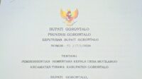 Cover Surat Keputusan Bupati Gorontalo tentang pemberhentian sementara Kades Motilango, foto/aiimnews.com/Herman Abdullah