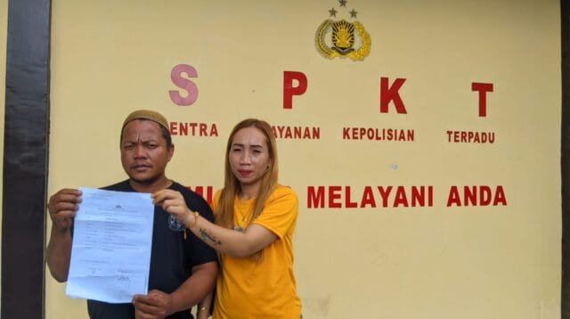 Pasangan Suami Istri (Pasutri) yang diduga menjadi korban penggelapan usai mendatangi Polda Gorontalo, foto/aiimnews.com
